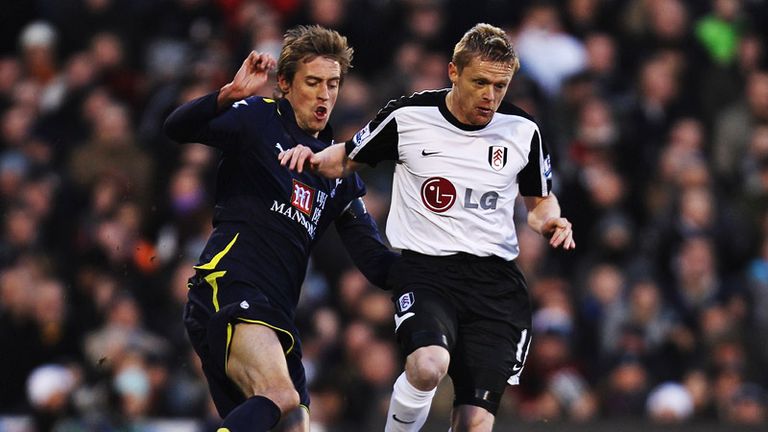 Damien Duff and Peter Crouch battle for possession in the first half