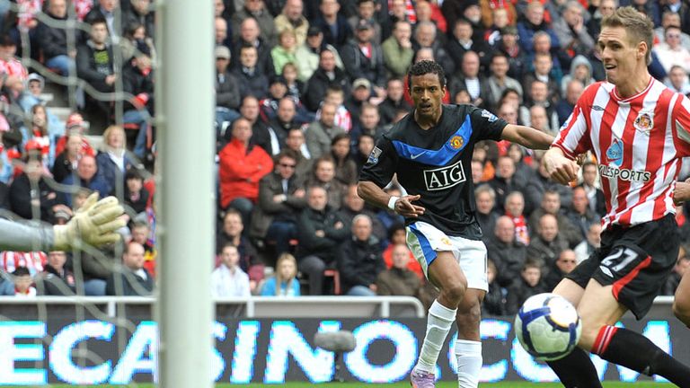 Nani curls the ball into the bottom corner to score for Man United