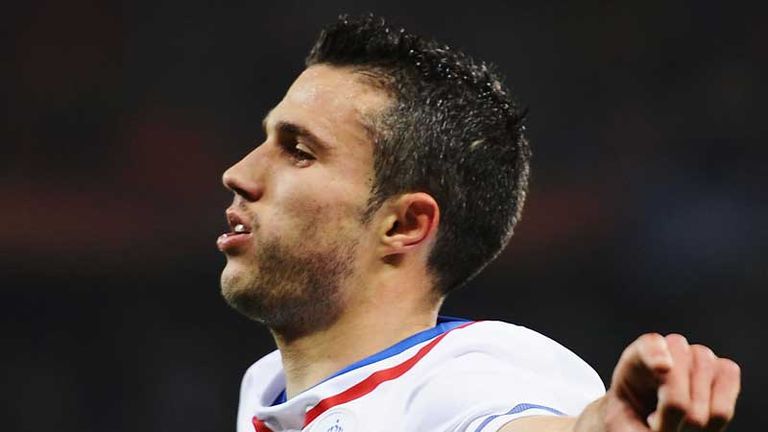 Holland striker Robin van Persie celebrates scoring the opener against Cameroon.