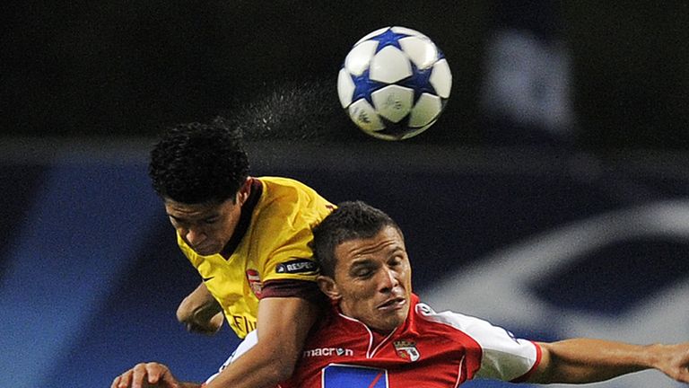 Rodrigo Lima and Denilson go for the ball as Braga host Arsenal in the UEFA Champions League.