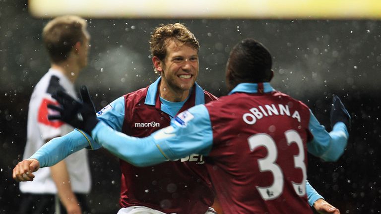 Jonathan Spector of West Ham United celebrates his opening goal against former club Manchester United with Victor Obinna