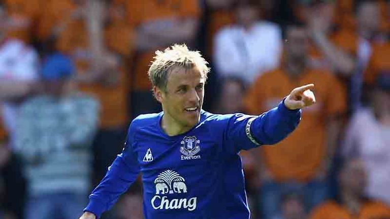 Phil Neville celebrates his goal at Wolves