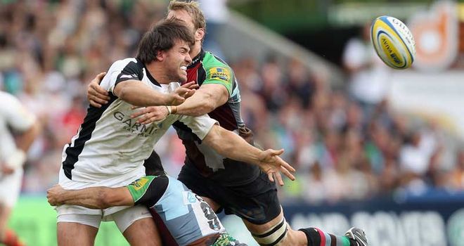 Schalk Brits offloads for Saracens at the Twickenham Stoop