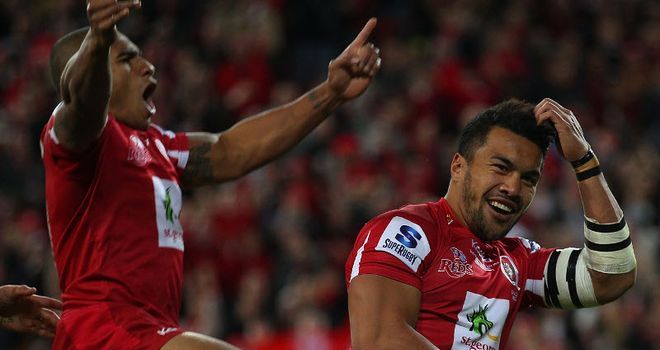 Queensland Reds celebrate a thrilling victory on home soil