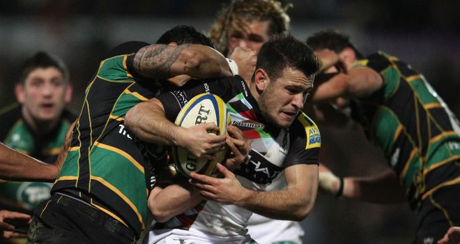 Quins scrum-half Danny Care is met by some solid Northampton defence