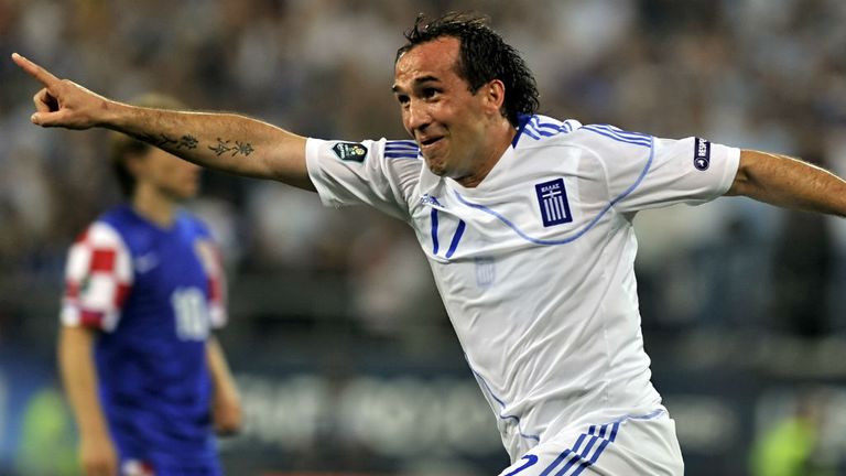 Celebrates scoring for Greece against Croatia in October 2011