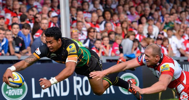 George Pisi: squeezes over in the corner for one of his two tries