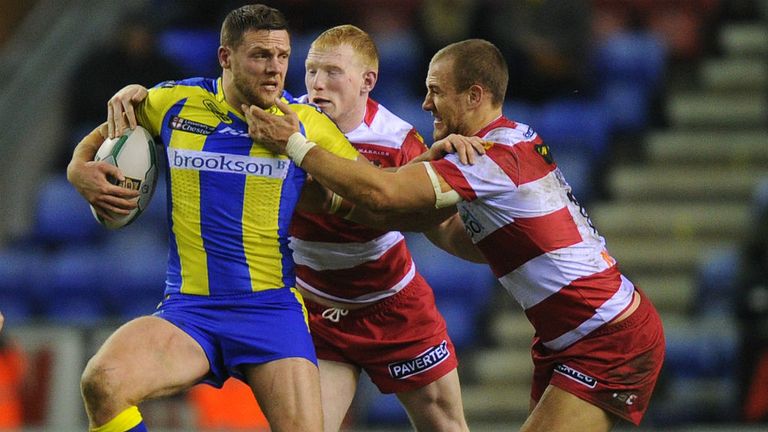 Warrington&#39;s Simon Grix: Tackled by Liam Farrell and Lee Mossop