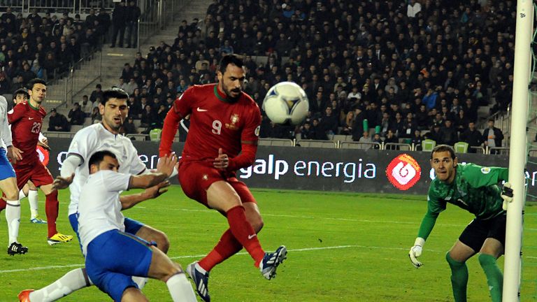 Hugo Almeida scores Portugal's second goal to defeat Azerbaijan 2-0.