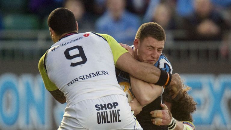 Glasgow fly-half Duncan Weir right is shackled by Ospreys&#39; Kahn Fotuali&#39;i