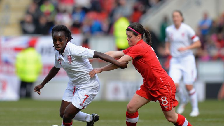 Eni Aluko of England is challenged by Diana Matheson of Canada during the friendly at The New York Stadium in Rotherham