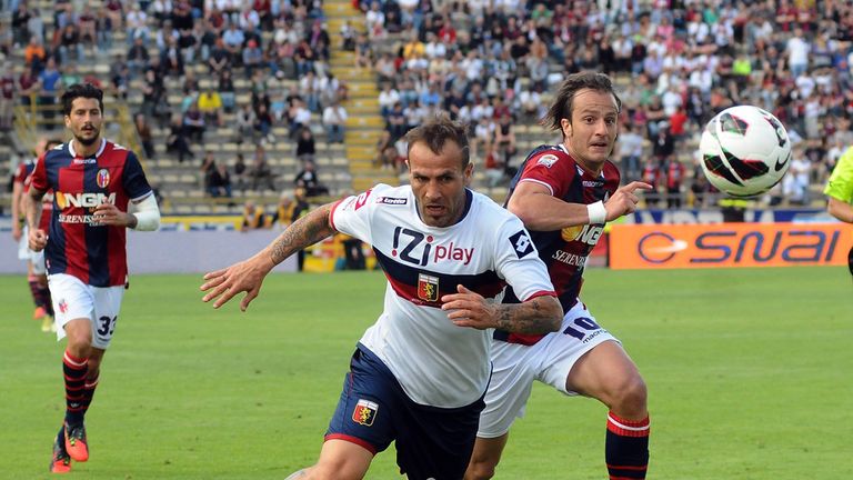 Daniele Portanova and Alberto Gilardino compete for the ball 