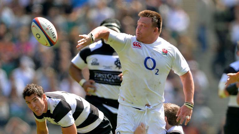 England v Barbarians - David Wilson offloads as he is tackled by Elliott Daly 