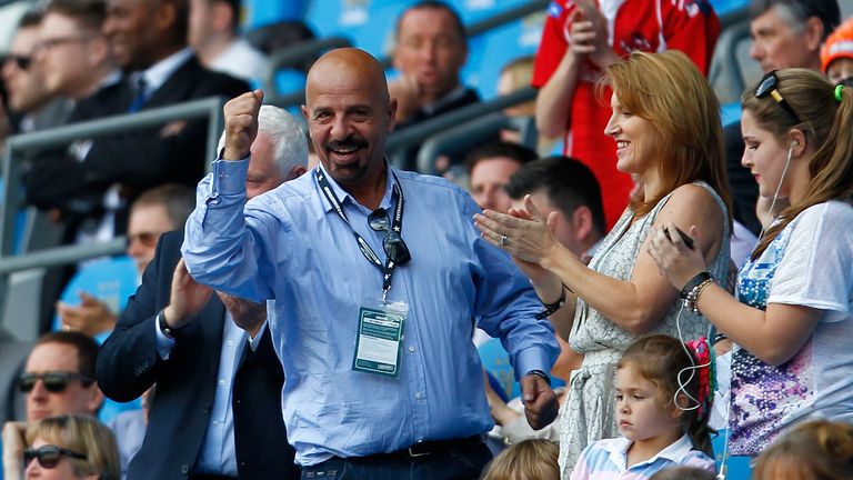 Salford City Reds owner Dr Marwan Koukash celebrates his side's victory over Widnes Vikings at Magic Weekend at the Etihad Stadium