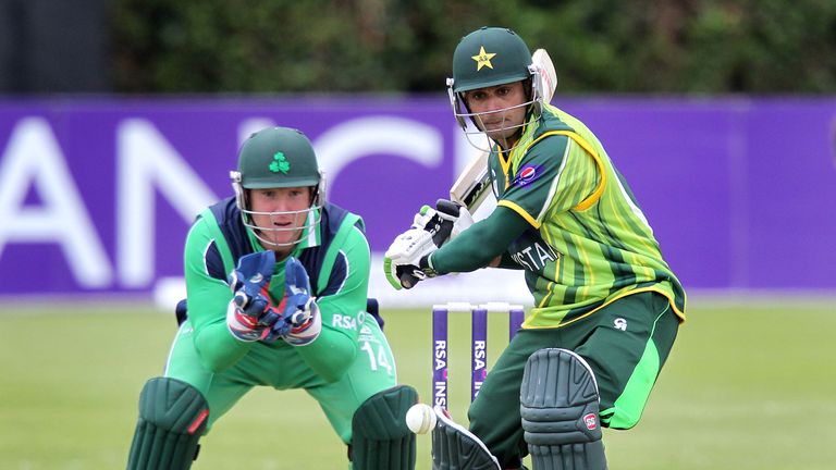 Pakistan's Mohammad Hafeez  prepares to play a shot as Ireland's wicketkeeper Niall O'Brien looks on.