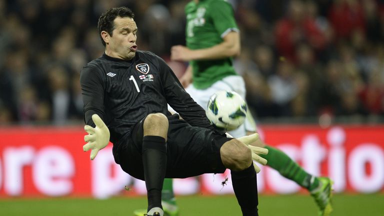 Republic of Ireland goalkeeper David Forde saves a shot by England midfielder Alex Oxlade-Chamberlain during the international friendly football match between England and Republic of Ireland at Wembley Stadium in north London on May 29, 2013. The match ended in a 1-1 draw.  AFP PHOTO / ADRIAN DENNISnnNOT FOR MARKETING OR ADVERTISING USE / RESTRICTED TO EDITORIAL USE        (Photo credit should read ADRIAN DENNIS/AFP/Getty Images)