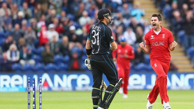 James Andeson of England celebrates bowling Martin Guptill (L) of New Zealand during the ICC Champions Trophy Group A match at the SWALEC Stadium