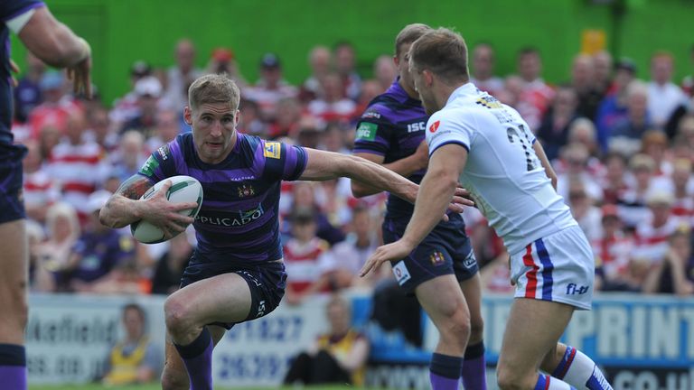 Wigan Warriors' Sam Tomkins makes a run during the Super League match at The Rapid Solicitors Stadium, Wakefield.