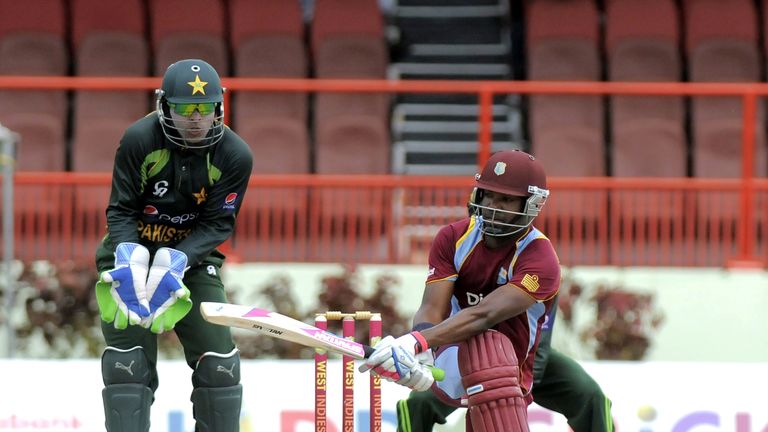 West Indies batsman Darren Bravo sweeps Pakistan bowler Saeed Ajmal the during the second One-Day International in Guyana