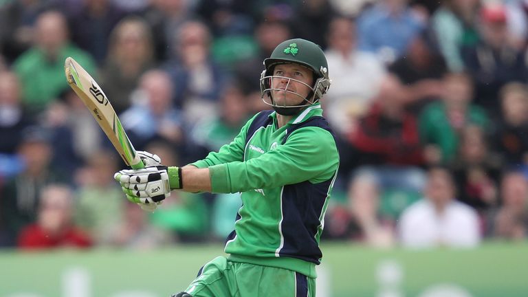 Ireland's Ed Joyce watches his shot to make his hundred during the second One Day International (ODI) cricket match between Pakistan and Ireland at Clontarf Cricket Club in Dublin on May 26, 2013.