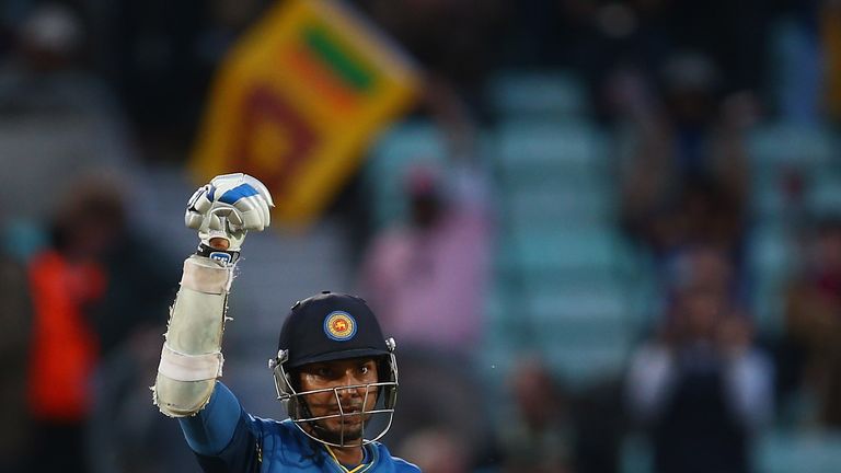 Kumar Sangakkara of Sri Lanka celebrates hitting the winning runs during the ICC Champions Trophy Group A match against England