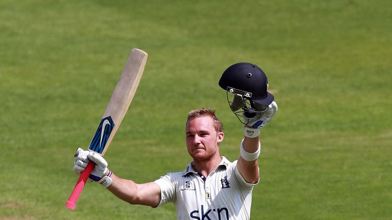 Laurie Evans of Warwickshire acknowledges the crowd after reaching his century during the LV=County Championship Division One match against Nottinghamshire at Edgbaston