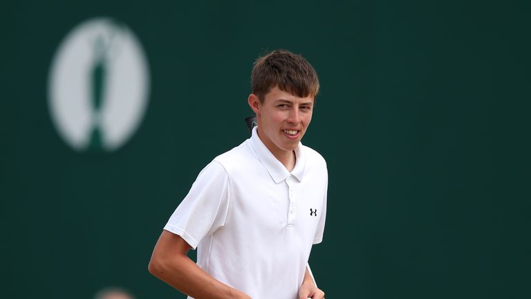 Matthew Fitzpatrick on the 18th green after winning the Silver Medal