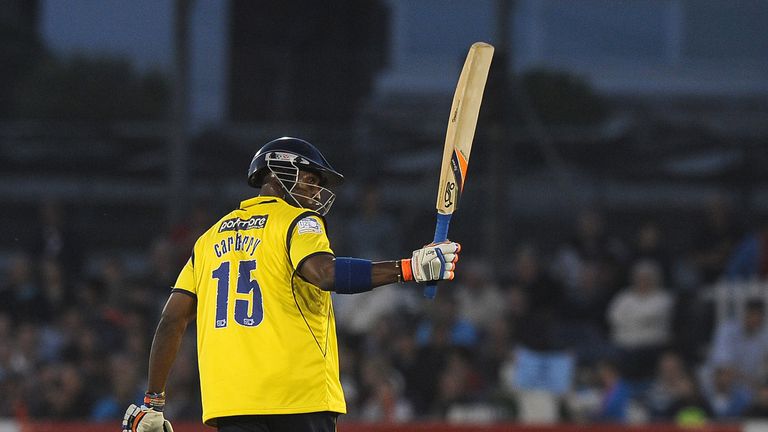 Michael Carberry of Hampshire celebrates his half century during the Friends Life T20 match between Sussex Sharks and Hampshire Royals at The Brighton and Hove Jobs County Ground on July 05, 2013 in Hove, England.