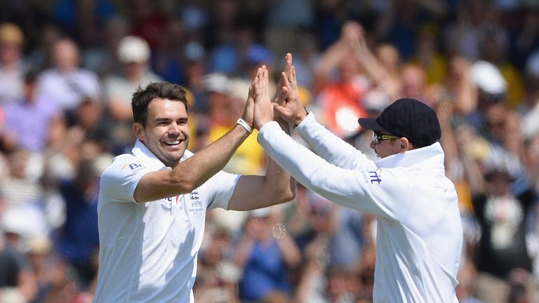James Anderson (L) of England celebrates the wicket of Peter Siddle of Australia with Ian Bell during day two of the 1st Investec Ashes Test match between England and Australia at Trent Bridge Cricket Ground
