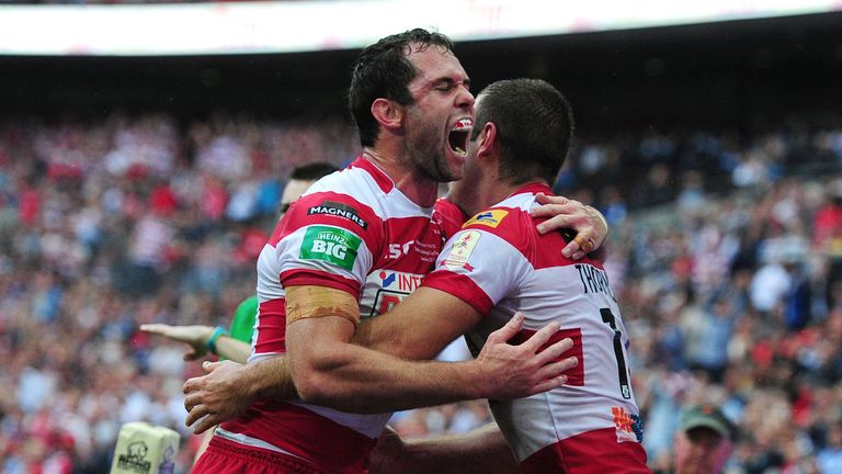 Pat Richards congratulates Wigan tryscorer Ian Thornley