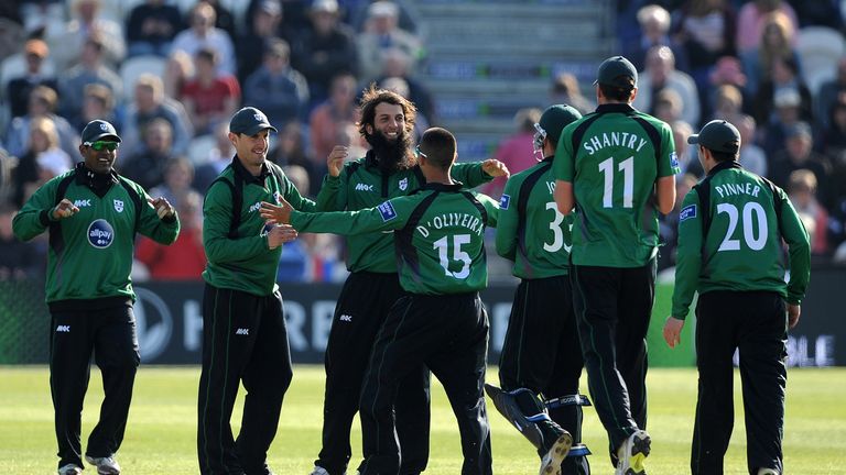 HOVE, ENGLAND - MAY 05: Moeen Ali of Worcestershire celebrates with team mates after getting the wicket of Matt Prior of Sussex during the Yorkshire Bank 40 League match between Sussex Sharks and Worcestershire Royals at The Brighton and Hove Jobs County Ground on May 05, 2013 in Hove, England. (Photo by Charlie Crowhurst/Getty Images)