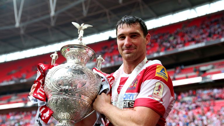 Matty Smith of Wigan Warriors with the trophy during the Tetley's Challenge Cup Final between Wigan Warriors and Hull FC at Wembley