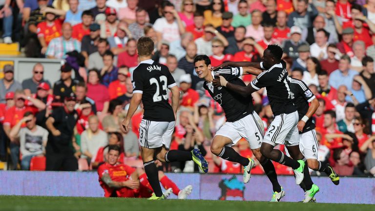 Southampton's Dejan Lovren celebrates his goal during the Barclays Premier League match at Anfield, Liverpool.