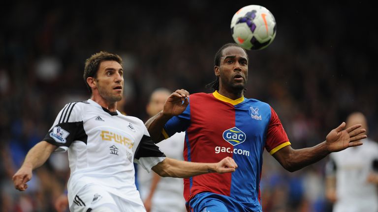 Swansea City's Angel Rangel (left) and Cameron Jerome (right) battle for the ball during the Barclays Premier League match at Selhurst Park, London.