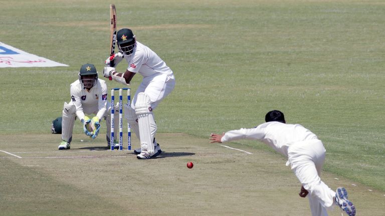 Zimbabwe's Hamilton Masakadza bats off the bowling of Younis Khan during the first day of the second test match between Pakistan and hosts Zimbabwe at the Harare Sports Club on September 10, 2013