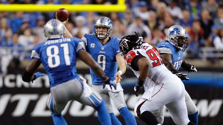 Matthew Stafford #9 of the Detroit Lions throws a second quarter pass to Calvin Johnson #81 while playing the Atlanta Falcons at Ford Field on December 22, 2012 in Detroit, Michigan. Atlanta won the game 31-18