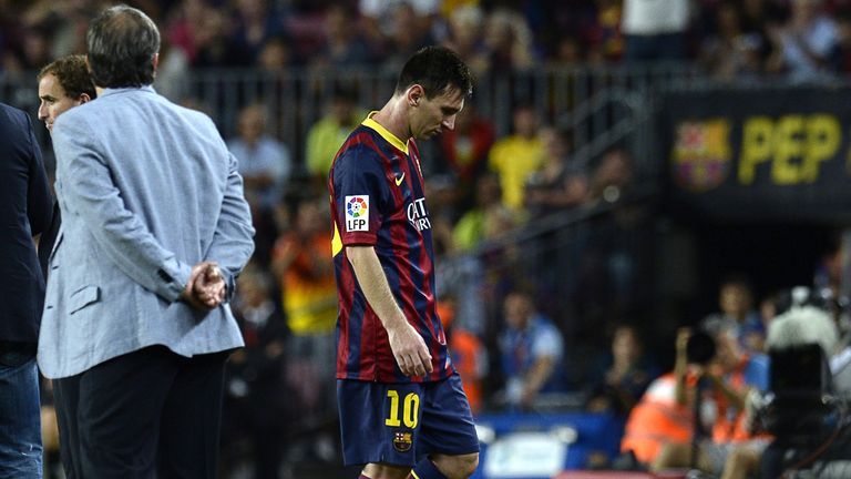 Barcelona's Argentinian forward Lionel Messi leaves the pitch during the Spanish league football match FC Barcelona vs Real Sociedad at the Camp Nou stadium in Barcelona on September 24, 2013.   AFP PHOTO/ LLUIS GENE        (Photo credit should read LLUIS GENE/AFP/Getty Images)