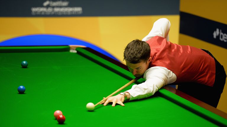 Michael Holt in action during his match against Ricky Walden during the Betfair World Snooker Championship at the Crucible Theatre on April 20, 2013 in Sheffield, England