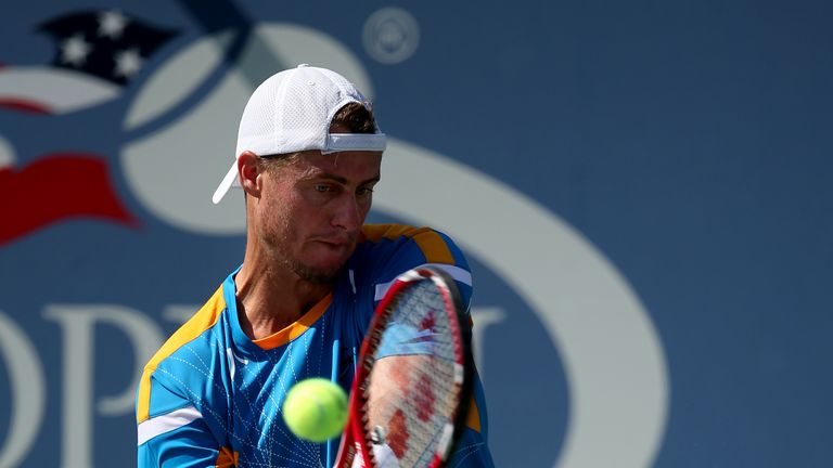 NEW YORK, NY - SEPTEMBER 03:  Lleyton Hewitt of Australia plays a backhand during his men's singles fourth round match against Mikhail Youzhny of Russia on Day Nine of the 2013 US Open at USTA Billie Jean King National Tennis Center on September 3, 2013 in the Flushing neighborhood of the Queens borough of New York City.  (Photo by Clive Brunskill/Getty Images)