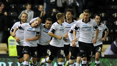 Craig Bryson (second from left): Celebrates late equaliser