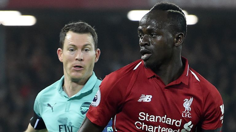Sadio Mane and Stephan Lichtsteiner were involved in a tussle early on at Anfield