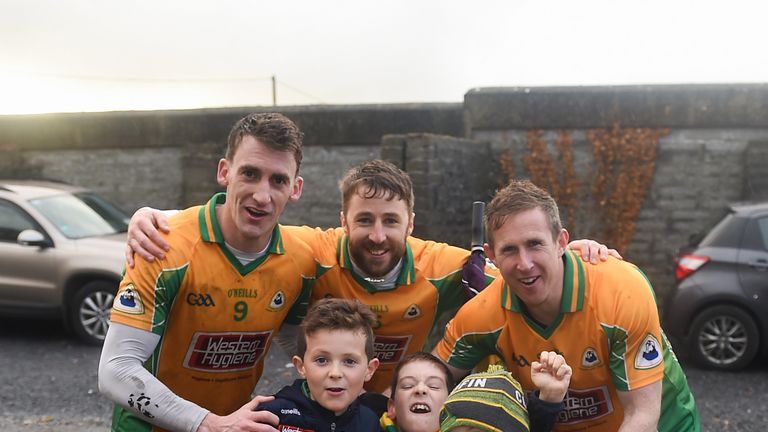 3 November 2019; Corofin players, from left to right, Ronan Steede, Miche..l Lundy, and Gary Sice, celebrate with the McLoughlin brothers, from left to right, Matthew, aged 8, Tom, aged 9, and Luke, aged 6, after the Galway County Senior Club Football Championship Final Replay match between Corofin and Tuam Stars at Tuam Stadium in Galway. Photo by Daire Brennan/Sportsfile